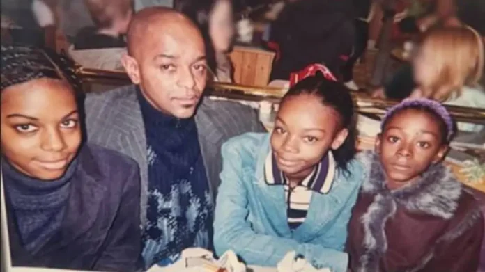 The three sisters, pictured here as teenagers with their father, died in the sea. From left to right, Jane Adetoro, Joseph, Christina Walters and Rebecca Walters Photograph: Sussex police